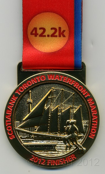 2012 Toronto WM 220.jpg - Maybe it was worth it for the shiny medal.
